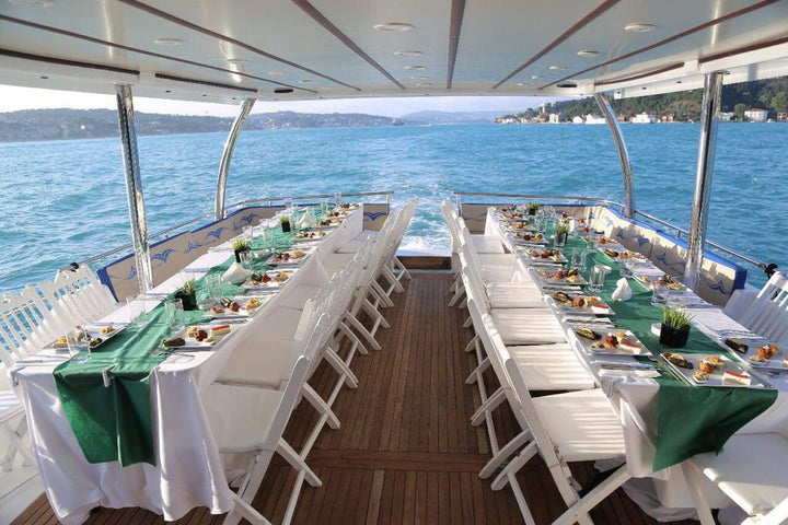 Spacious LUXURY PAY yacht deck, hosting up to 35 guests for exclusive gatherings with Istanbul's skyline in view.