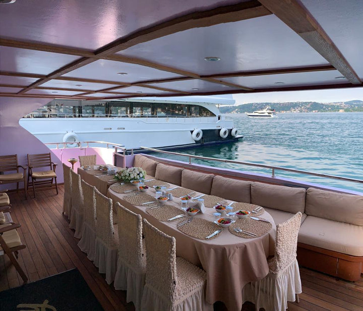 Spacious deck of LUXURY ÇNG, designed for up to 35 guests, setting sail on Istanbul’s majestic waters.