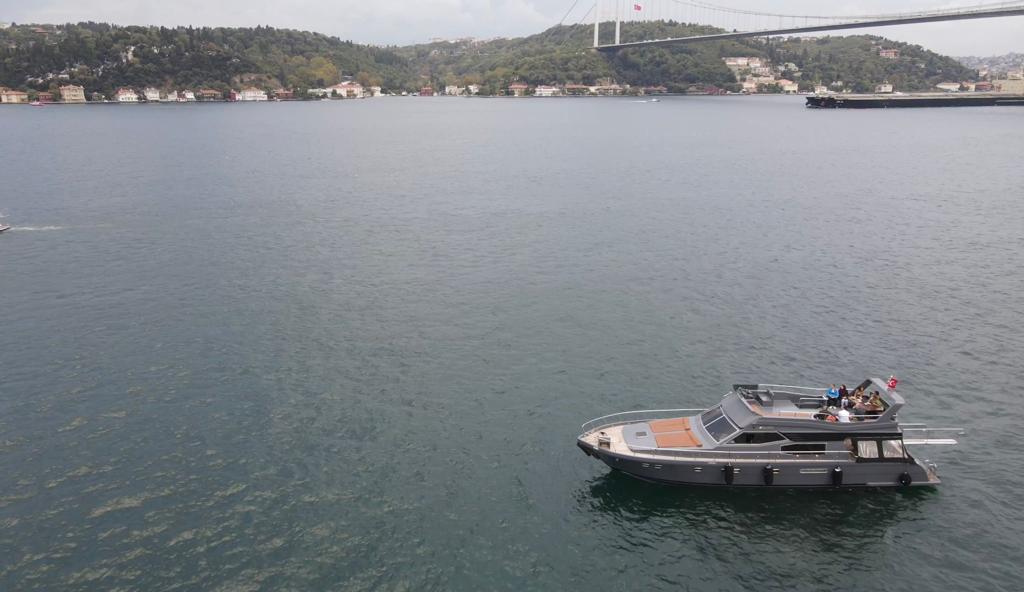 A luxury yacht's voyage alongside Istanbul's ancient city walls, a journey through history