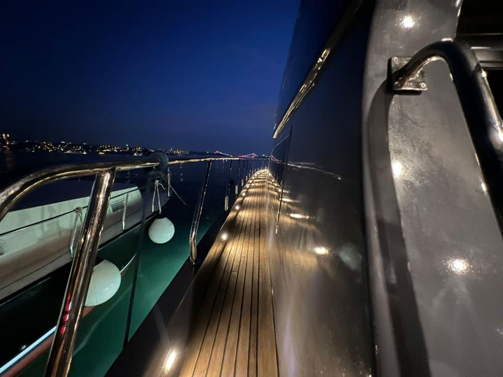 LUXURY DRVS yacht setting sail on the Bosphorus, offering a premier charter experience in Istanbul