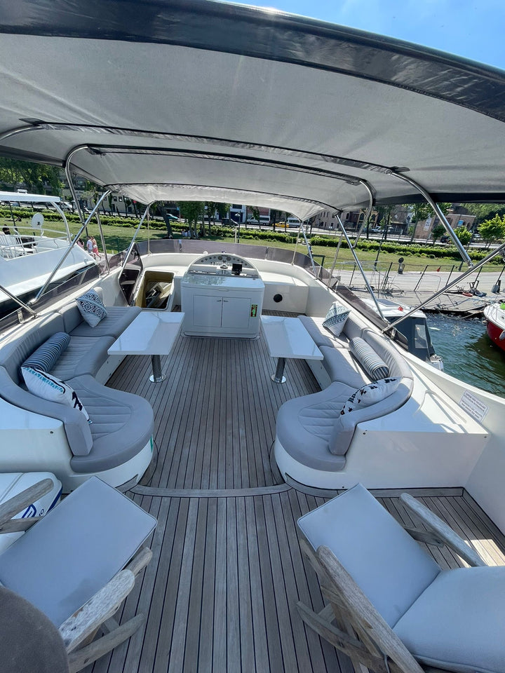 Spacious and opulent yacht deck set against the backdrop of Istanbul’s enchanting waters.