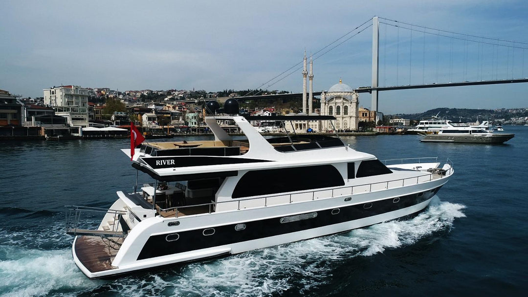 Stylish lounge area on yacht cruising Istanbul's Bosphorus.