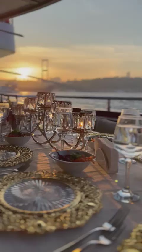 Sunset view from a luxury yacht on the Bosphorus, blending natural beauty with opulence