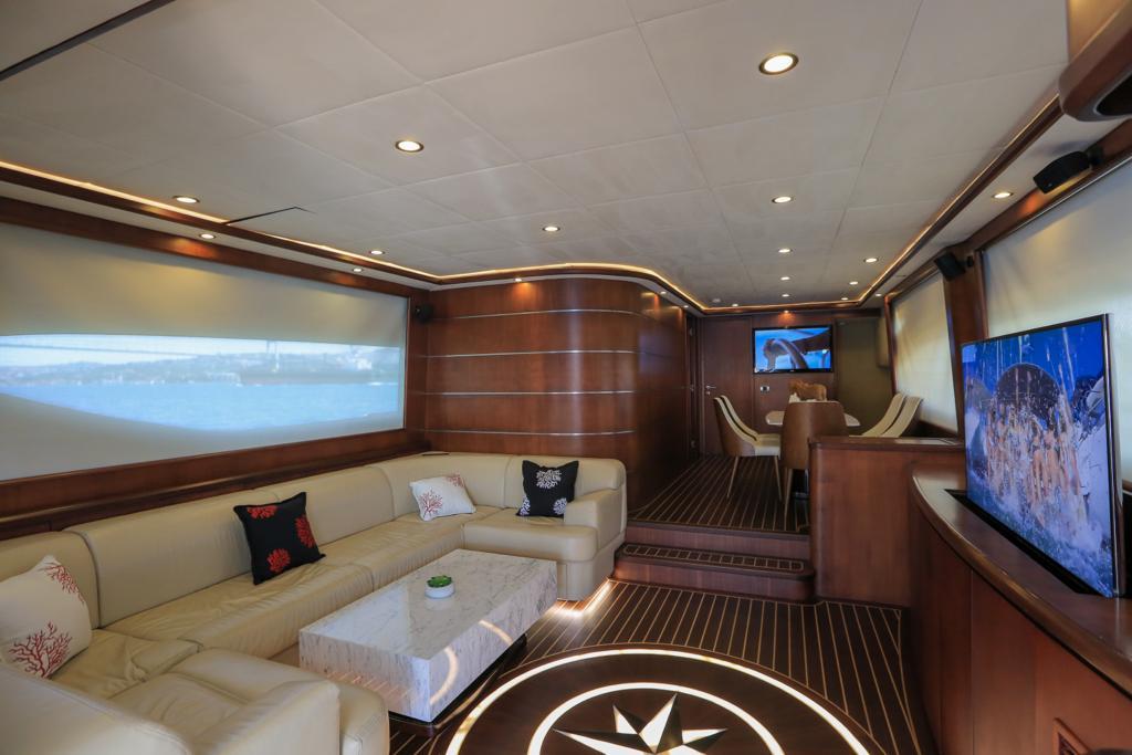 Stylish interior of a luxury yacht in Istanbul offering high-end amenities and comfortable seating areas.