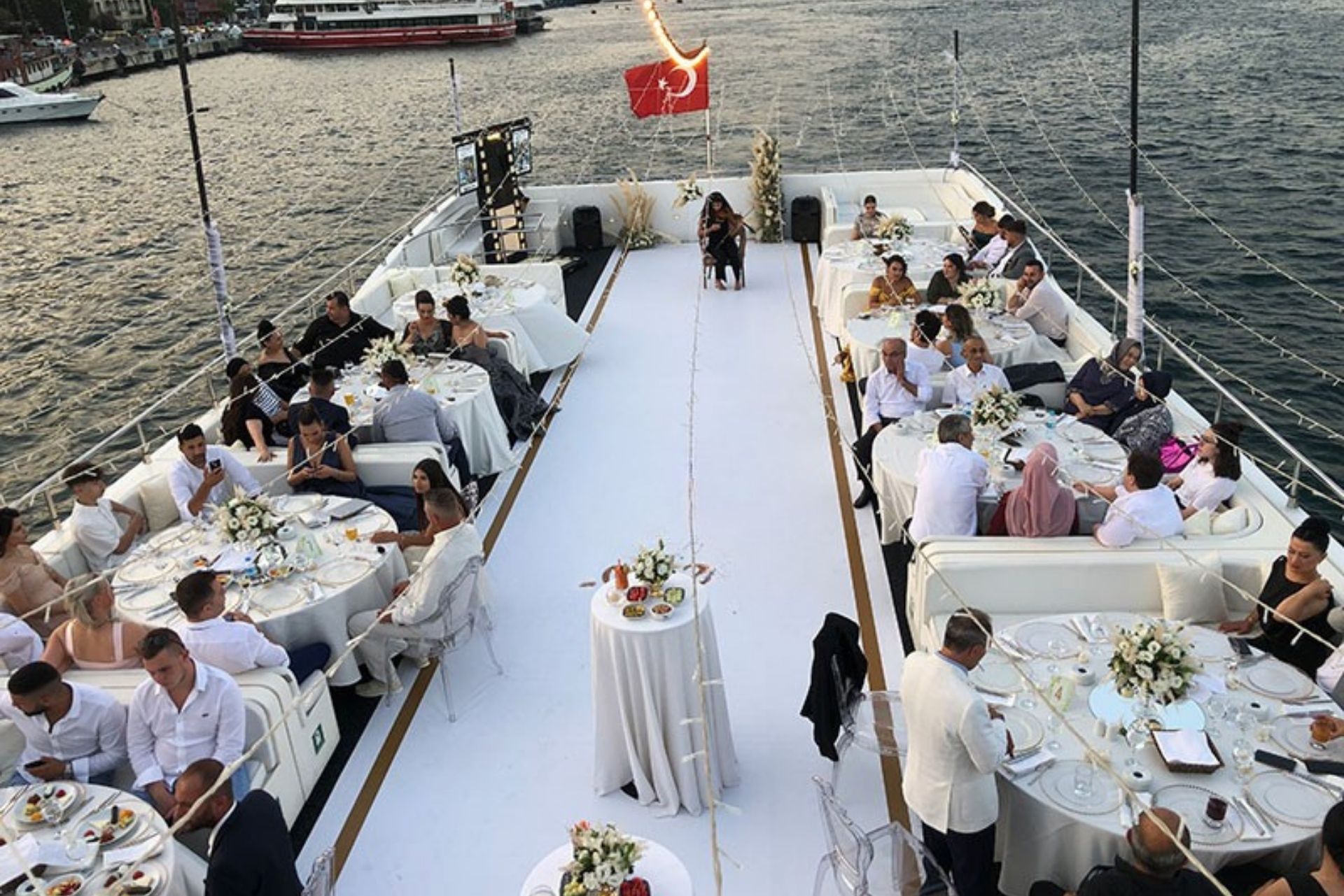Bosphorus wedding yacht in Istanbul at sunset with panoramic skyline views